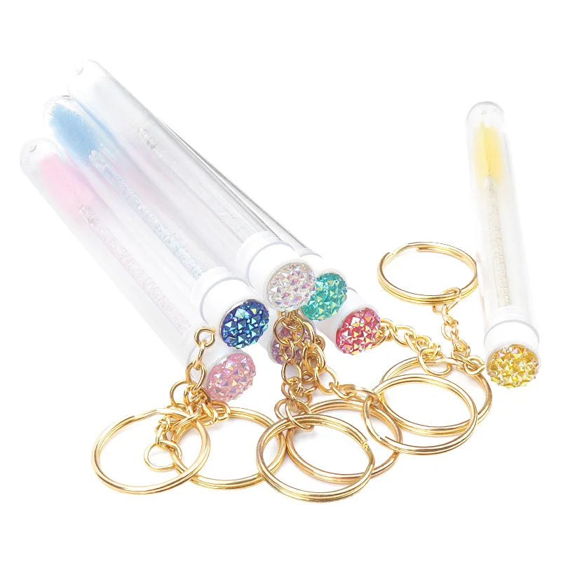 10 Peças Escova de Cílios em Tubo com Chaveiro Dourado e Glitter