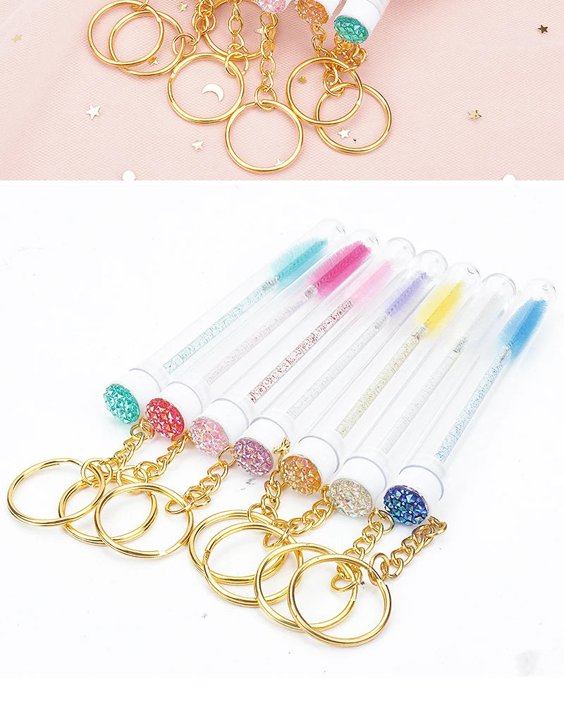 10 Peças Escova de Cílios em Tubo com Chaveiro Dourado e Glitter