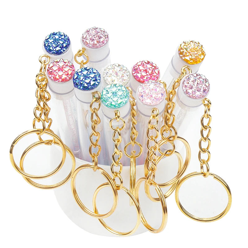 10 Peças Escova de Cílios em Tubo com Chaveiro Dourado e Glitter